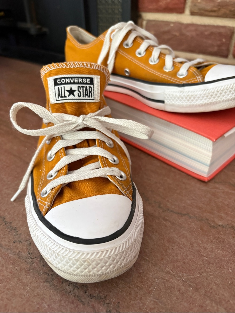 Converse Women All Star Low Top Sneakers in Mustard Yellow